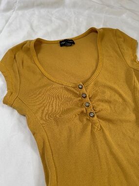 y2k Seductions ribbed rhinestone-buttoned henley shortsleeved top